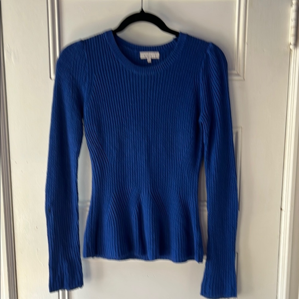 Bright Blue, beautifullly shaped knit sweater.